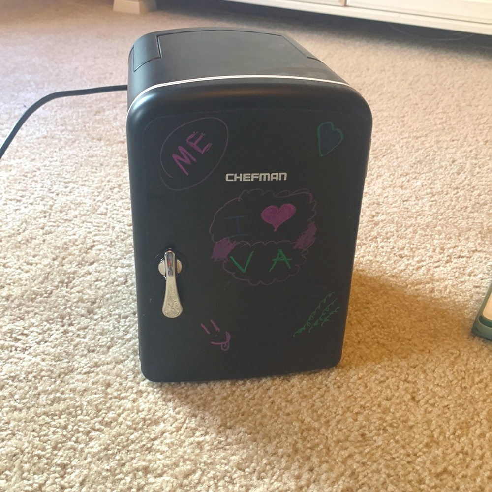 This is a mini fridge with markers that are erasable and very easy to travel